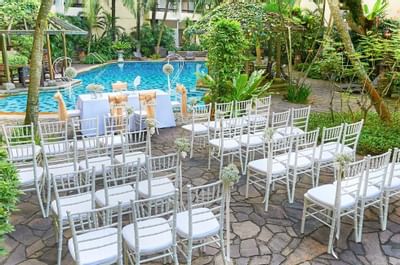 Wedding Ceremony by the outdoor pool at Goodwood Park Hotel