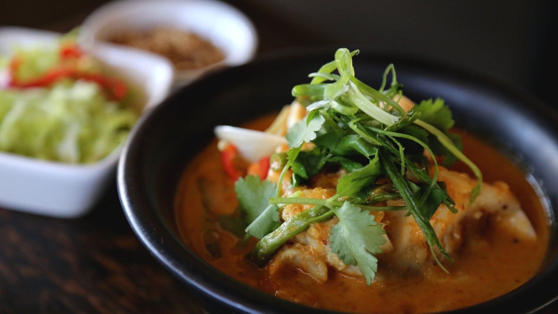 Close-up of meat dish served at Warwick Hotels and Resorts