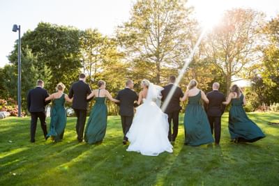 Wedding couple with bridesmaids & best men at The Portsmouth