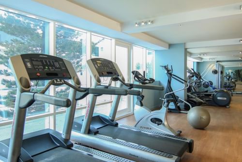 fitness center with cardio equipment