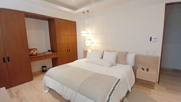 Closet by the king bed in Two Bedroom Premier at Live Aqua Private Residences Marina Vallarta