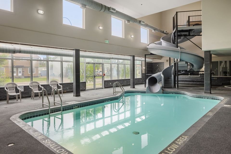 Interior of Indoor pool & water slide at Home Hotels