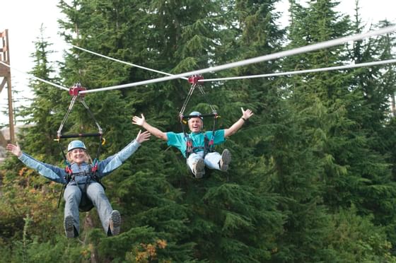 Couple zip lines in grouse mountain near Granville Island Hotel