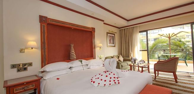 Interior of Superior Room with king bed at Kigali Serena Hotel