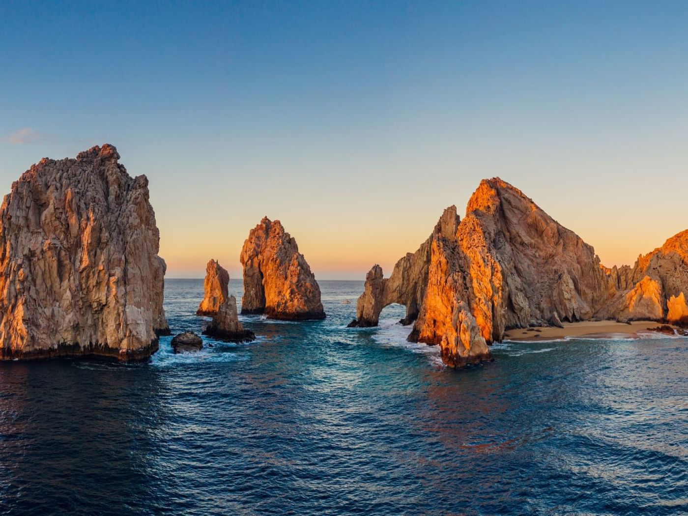 The Arch of Cabo San Lucas on a sunny day near Gamma Hotels