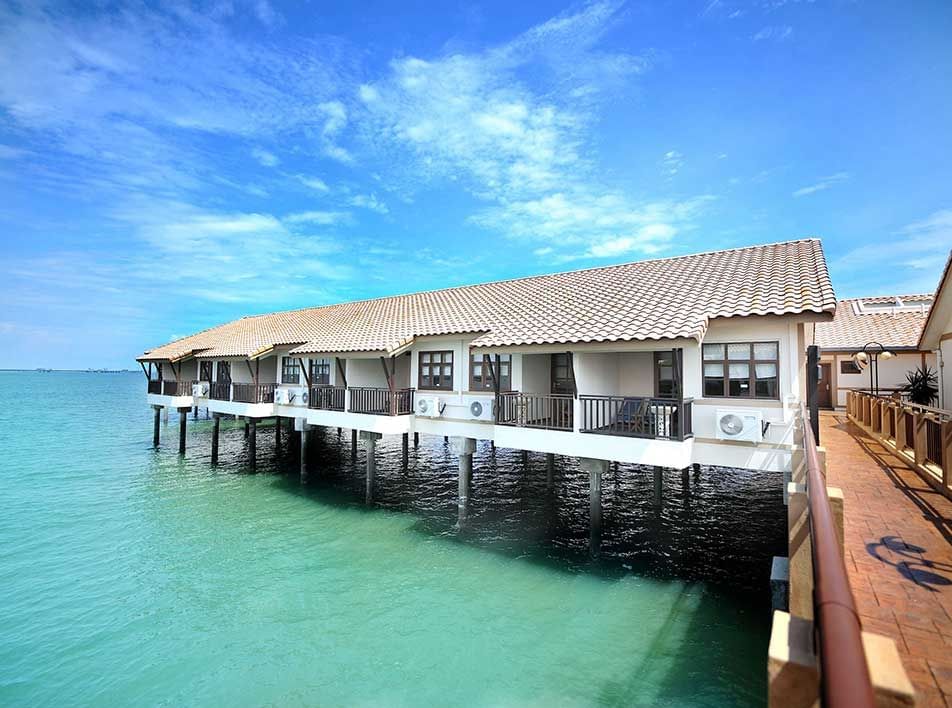 a row of water chalets overlooking the sea - Lexis PD