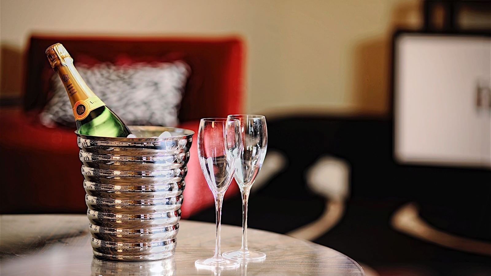Close-up of Champagne bottle with 2 glasses at The Mayo Hotel