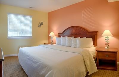 Nightstands by the King Bed in 2 Bedroom Apartment at South Beach Apartments, hotels in Ocean City MD