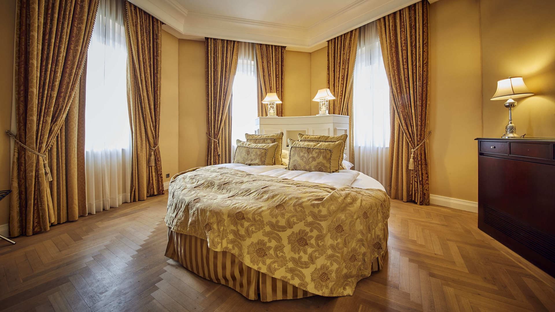 Comfortable large bed in Turm Suite at Falkensteiner Hotels