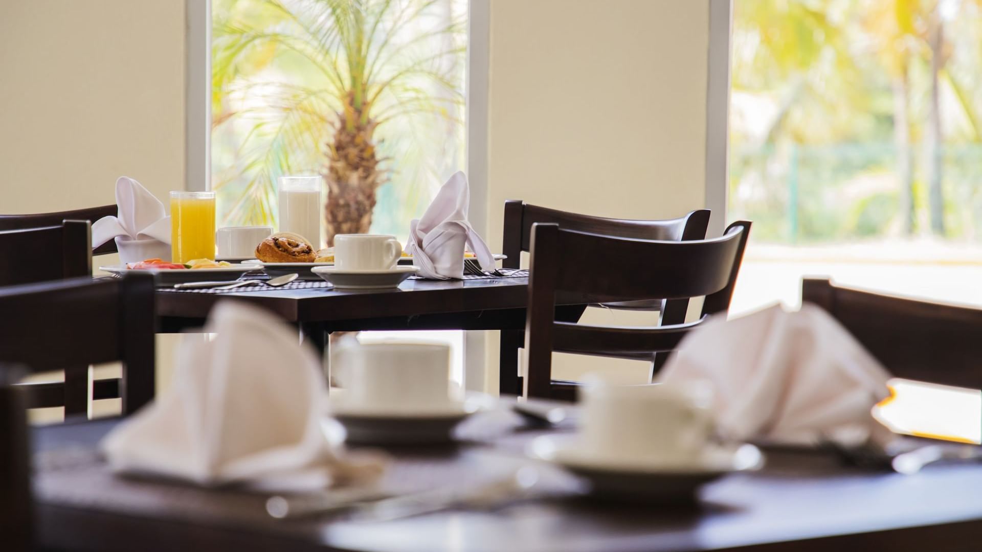 Close-up of the arranged dining tables at Gamma Tampico