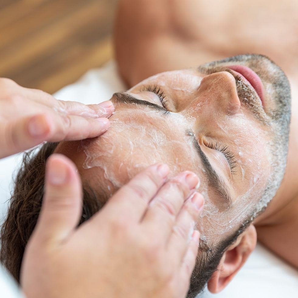 Close-up of male facial session at Falkensteiner Hotels
