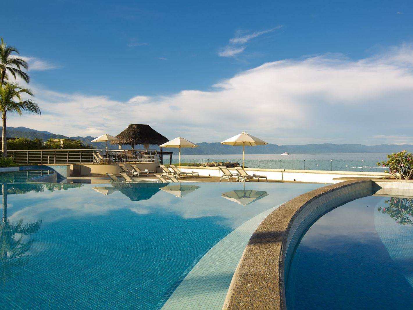Pool overlooking the beach at Sunset Plaza Beach Resort