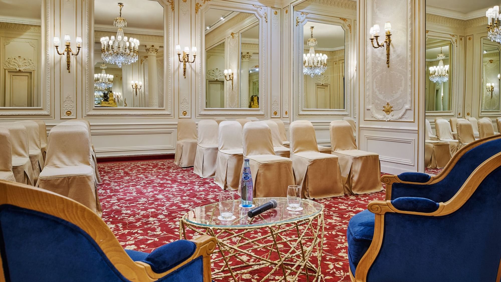 Capucines meeting room event space featuring chairs set up with elegant mirrored walls at Hôtel Westminster - Paris