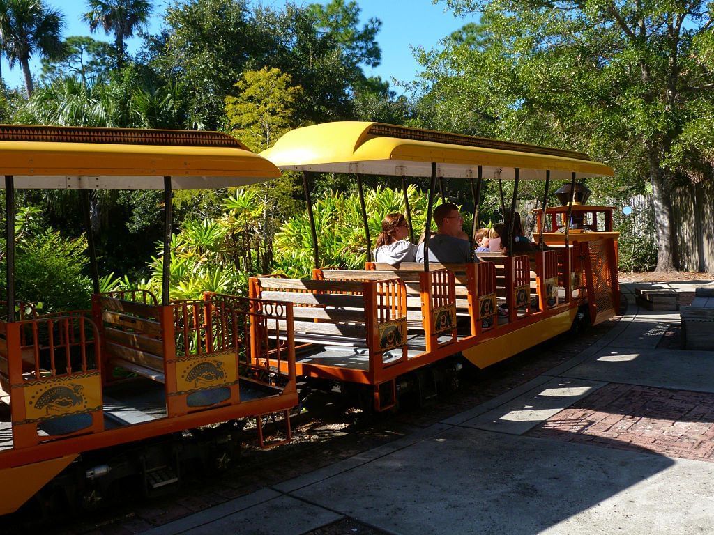 Passengers on a park tram in Harry P. Leu Gardens near Lake Buena Vista Resort Village & Spa