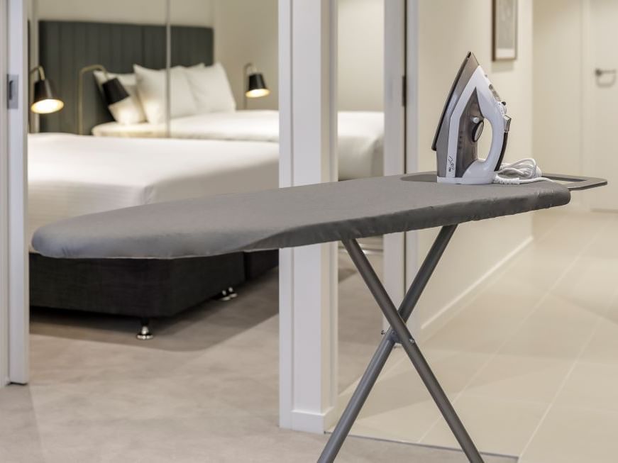 Iron and ironing board in a apartment at Brady Apartment Hotel Flinders Street