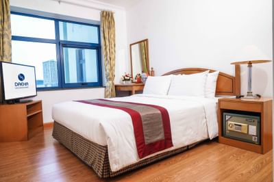 Room with comfy bed, safety locker, TV at Hanoi Daewoo Hotel