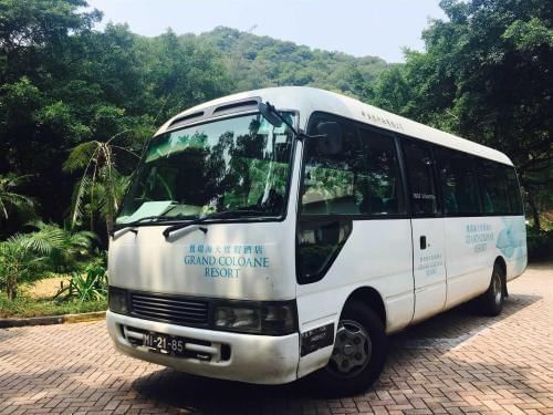Closeup on a hotel shuttle bus by Grand Coloane Resort