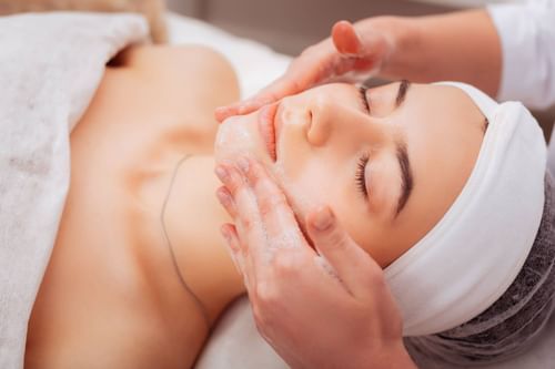 Client having a face massage at Getaway Spa&Salon at MCM El.H.O