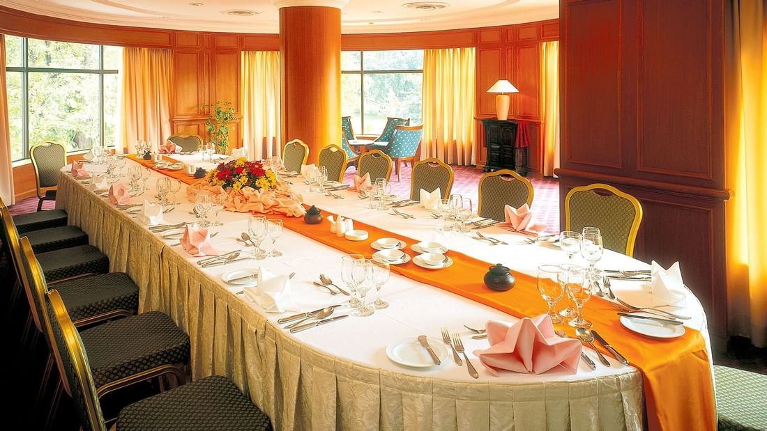 Long table arranged with flowers & cutlery for an Event at Sunway Hotel Phnom Penh