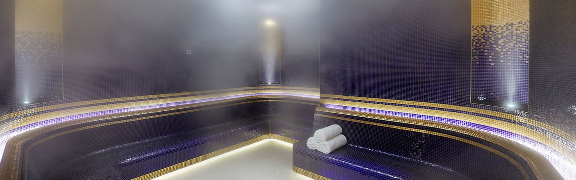 Interior of a sauna with towels at Crown Perth