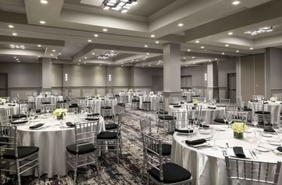 banquet room with round tables and chairs