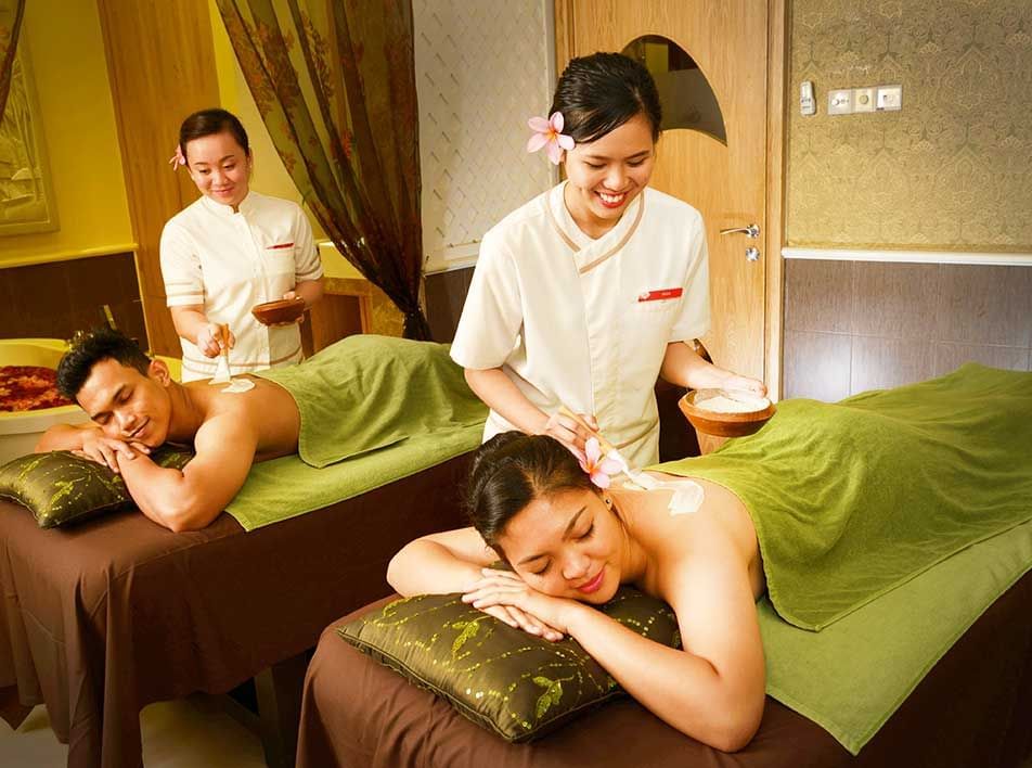 two people indulging in a rejuvenating massage by massage therapists at Lexis PD Resort