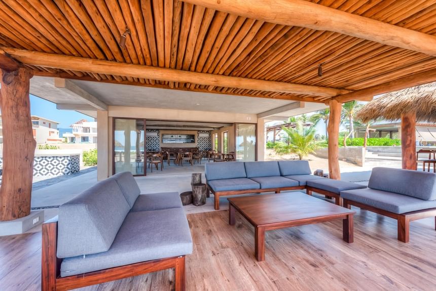 Outdoor lounge area at Marea Beachfront Villas