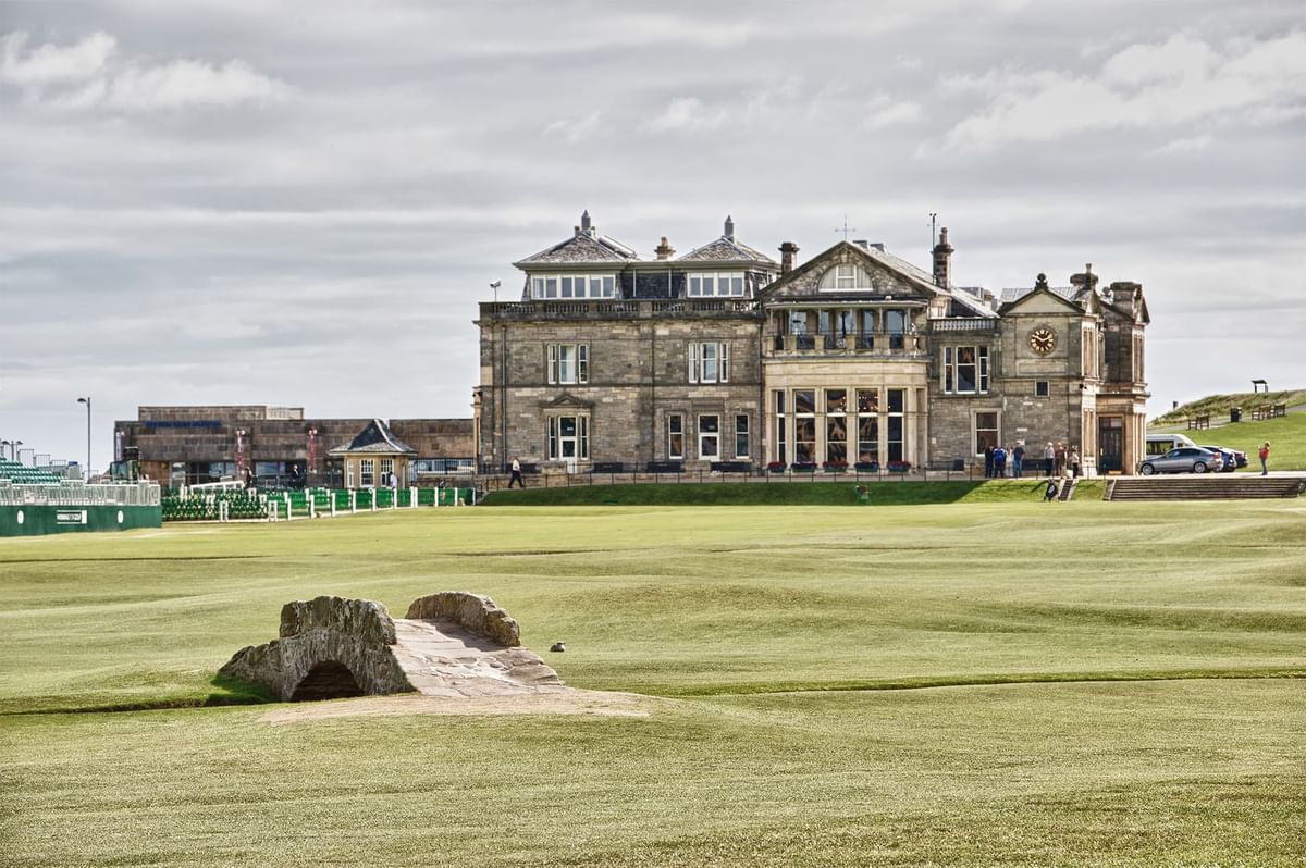 Old Course with lush golf course and small stone bridge near St Andrews Golf Hotel
