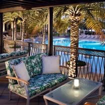 Pool front dining area in Giardino at Palazzo Versace Dubai