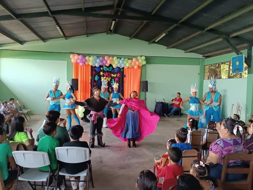 Frozen cartoon characters perform in front of children near Fiesta Resort