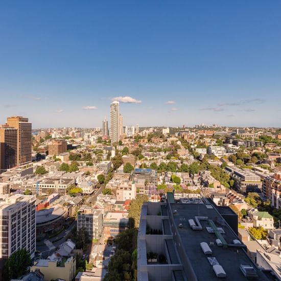 Aerial view of city under the blue sky near Pullman Sydney Hyde Park