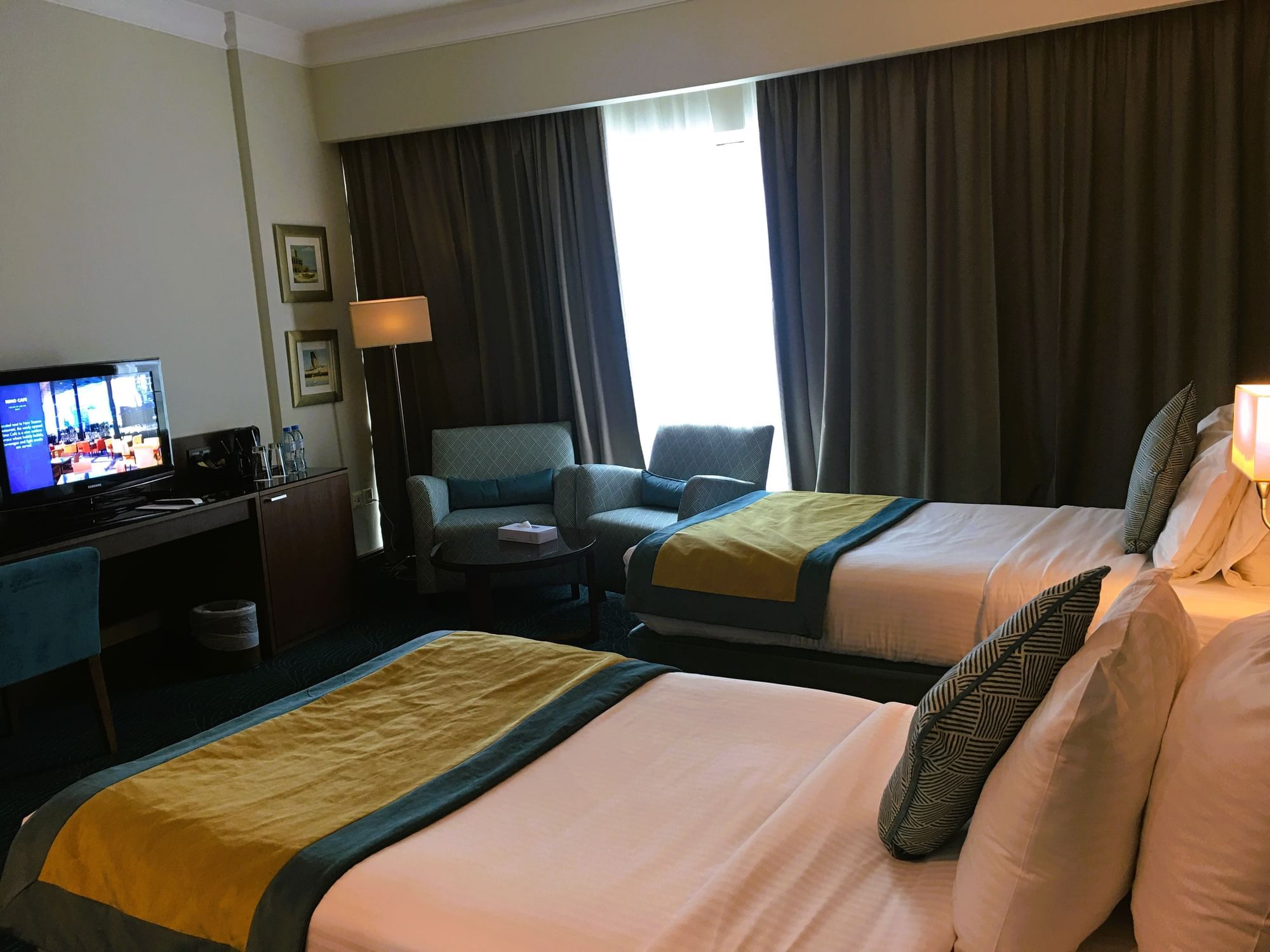 2 Beds, TV & lounge area in Deluxe Room at City Seasons Dubai