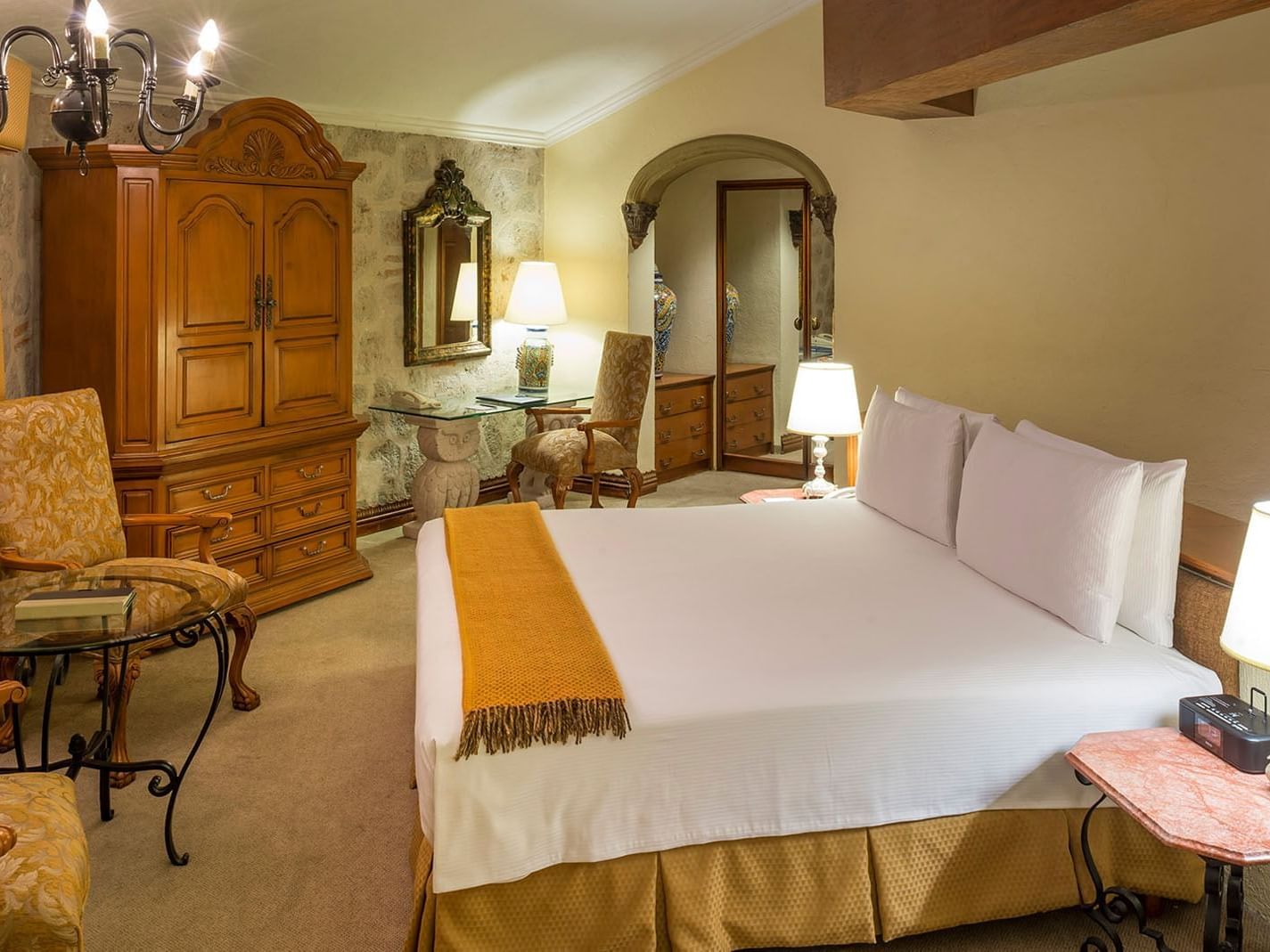 King Presidential Suite, an ornate wooden armoire and glass desk in a historic-style at Quinta Real Aguascalientes