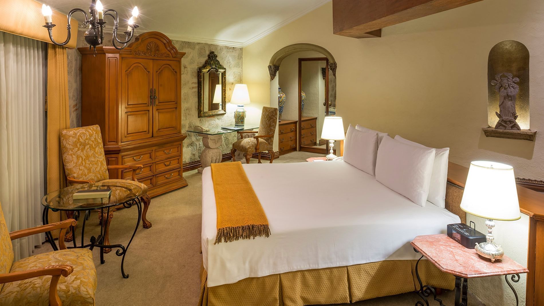 King Presidential Suite, an ornate wooden armoire and glass desk in a historic-style at Quinta Real Aguascalientes