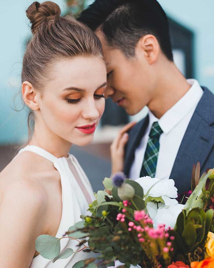 bride and groom posing for their wedding picture - Lexis MY