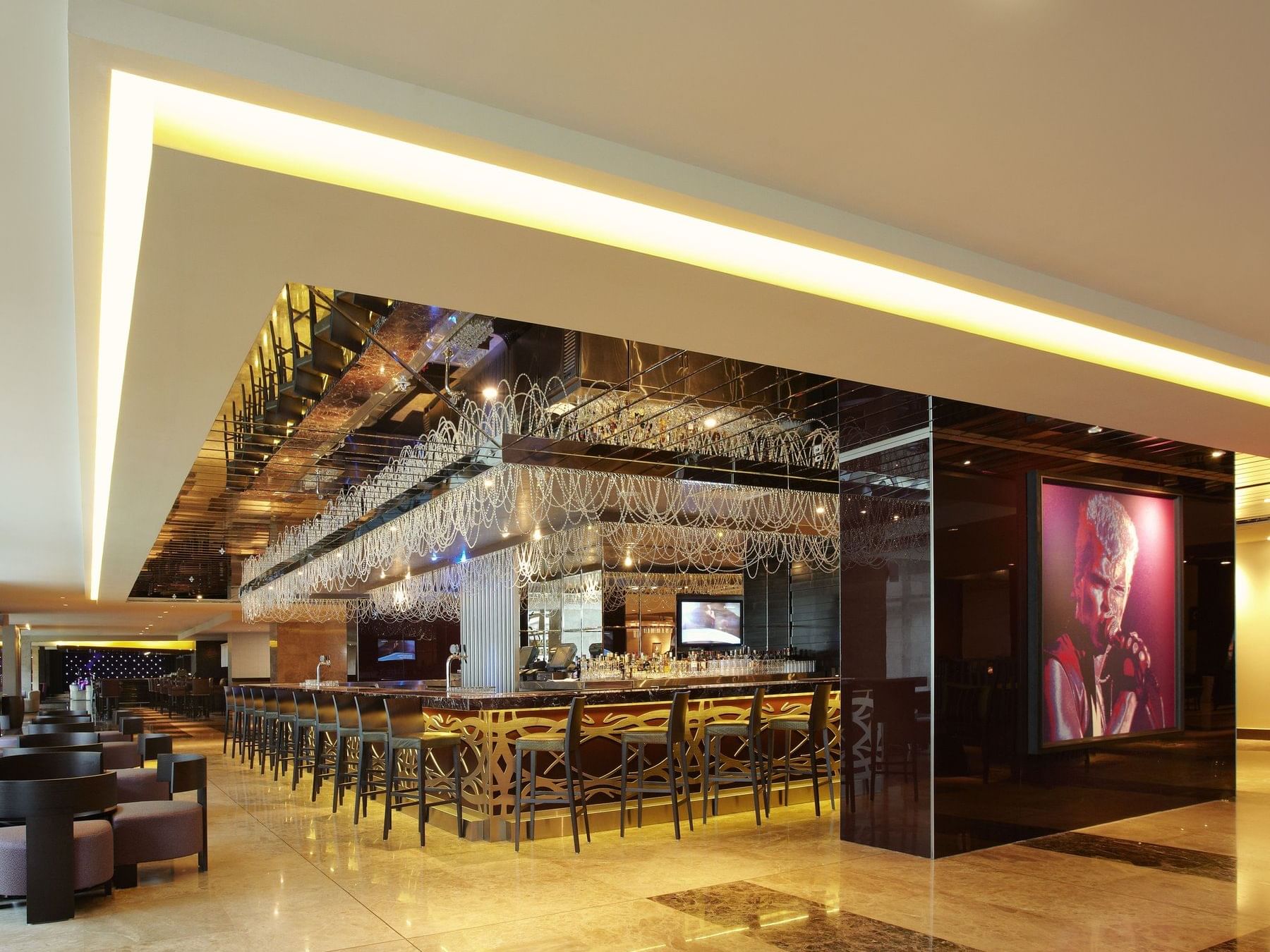 Elegant hotel lobby with well-designed Mamie Lee's at Megapolis Hotel Panama