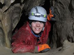 A man inside Canmore Caves near Clique Hotels & Resorts