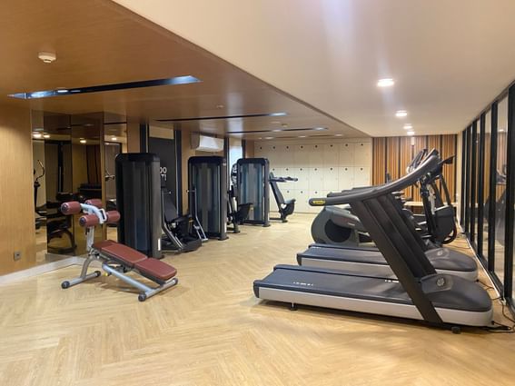 Fitness equipments in a gym & wellness center at LK Pemuda Semarang Hotel & Residences