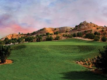 Scenic Boulder Nine course at Towa Golf Club near Hilton Santa Fe Buffalo Thunder, set against stunning desert hills