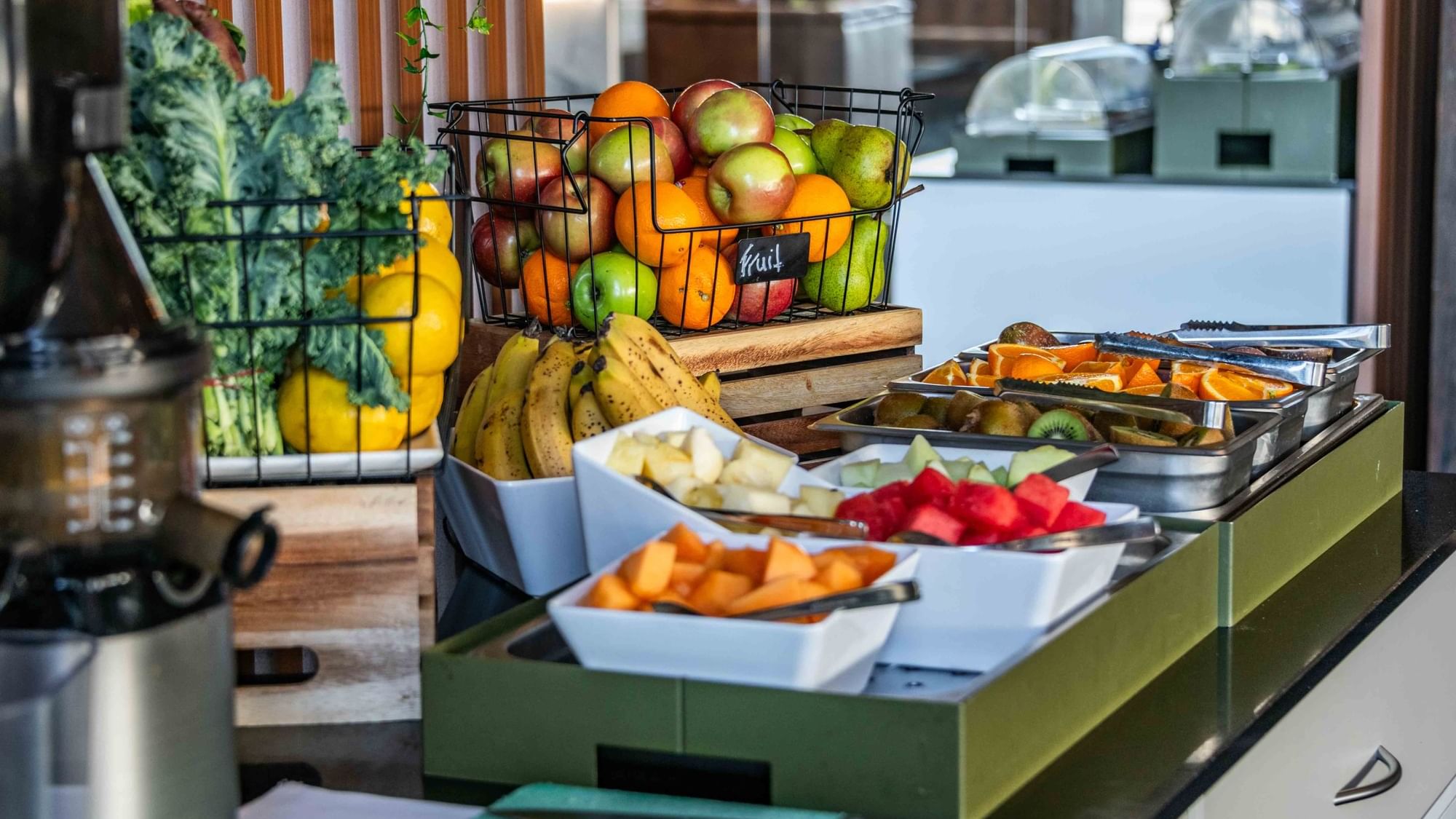 Assorted fresh fruits displayed in baskets and trays at Buffet Breakfast, Mercure Kooindah Waters