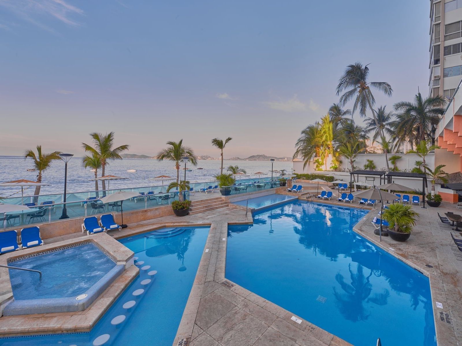 Outdoor pool overlooking the sea at Gamma Hotels