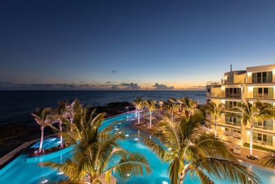 Distance view of The Morgan Resort Spa Village at night