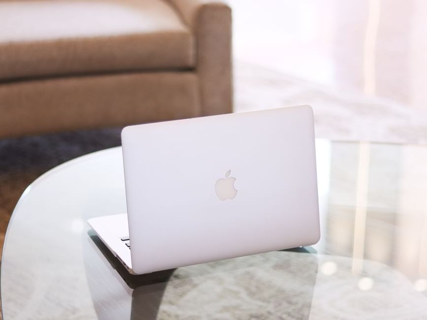 Close-up of an Apple Mac Book Air on the table at The Fredonia Hotel