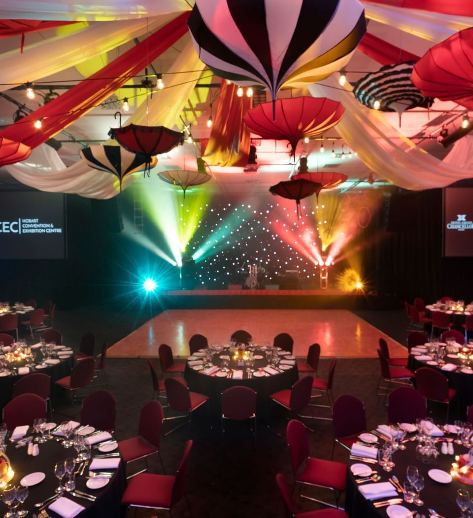 Gathering space with a dance floor and decorated ceiling at Hotel Grand Chancellor Hobart