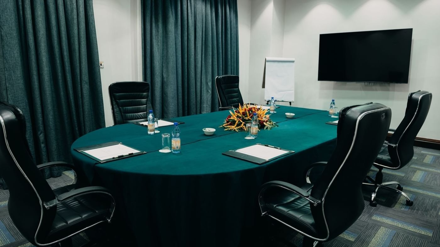 Bukasa Board Room with table and chairs at Lake Victoria Serena Golf Resort & Spa in Kampala.