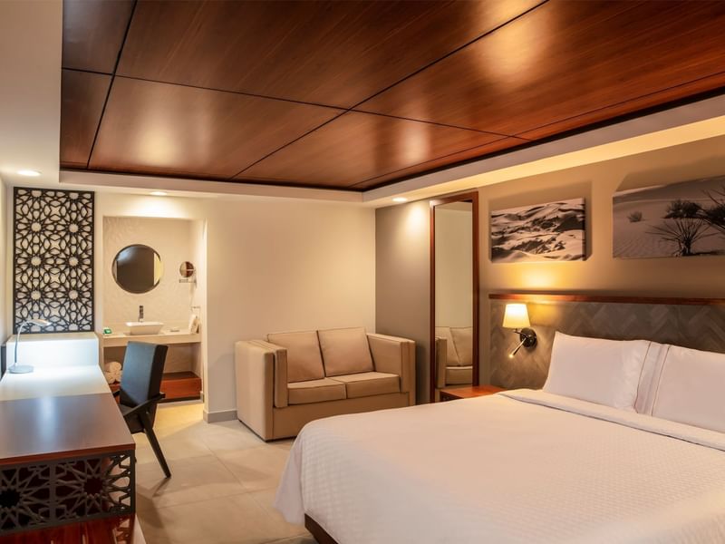 Bed & desk in Deluxe Room, 1 King at Fiesta Americana Travelty