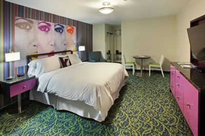 Interior of Deluxe King room with Tv at 7 Springs Inn & Suites