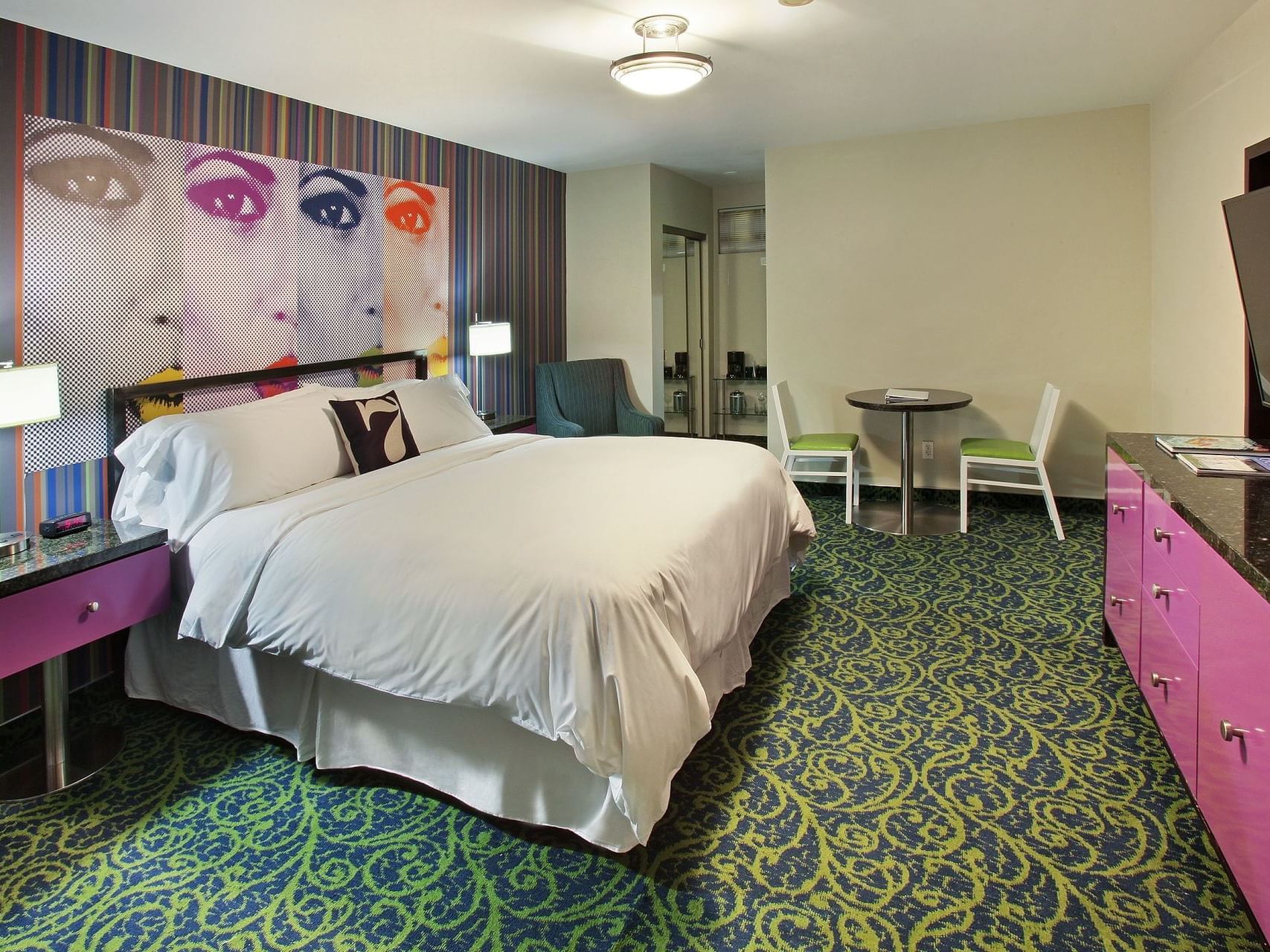 Interior of Deluxe King room with Tv at 7 Springs Inn & Suites