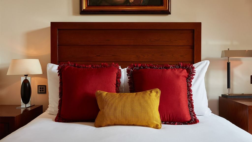 Bed & 2 nightstands in Double Room River View at Guoman Hotels