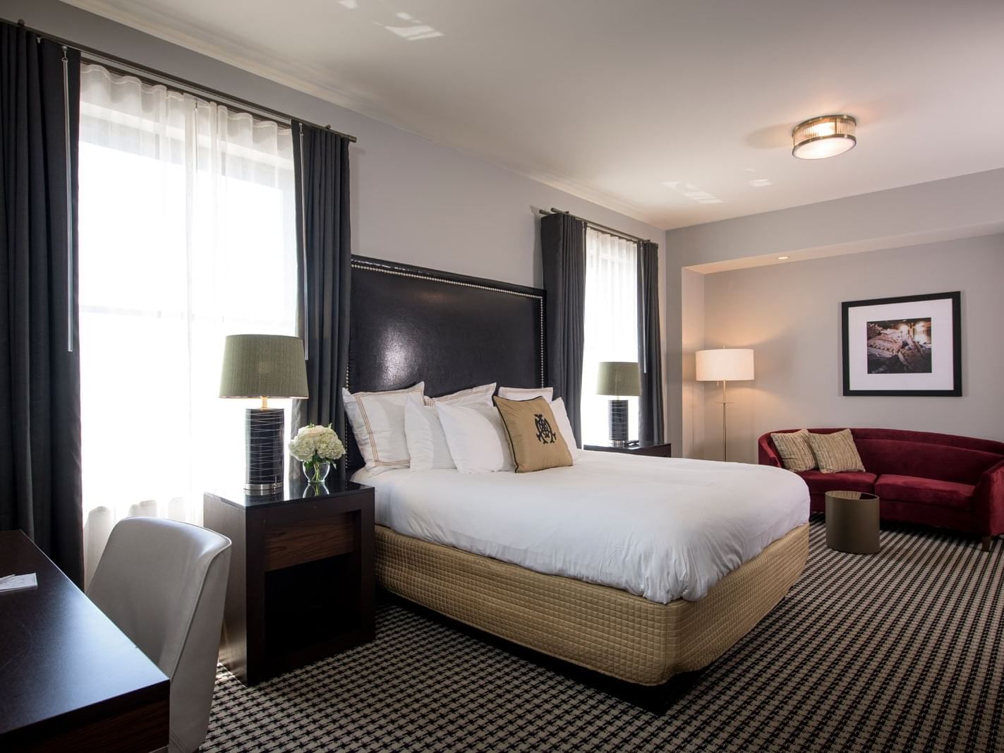 King bed, sofa & working table in Mayo Suite at The Mayo Hotel